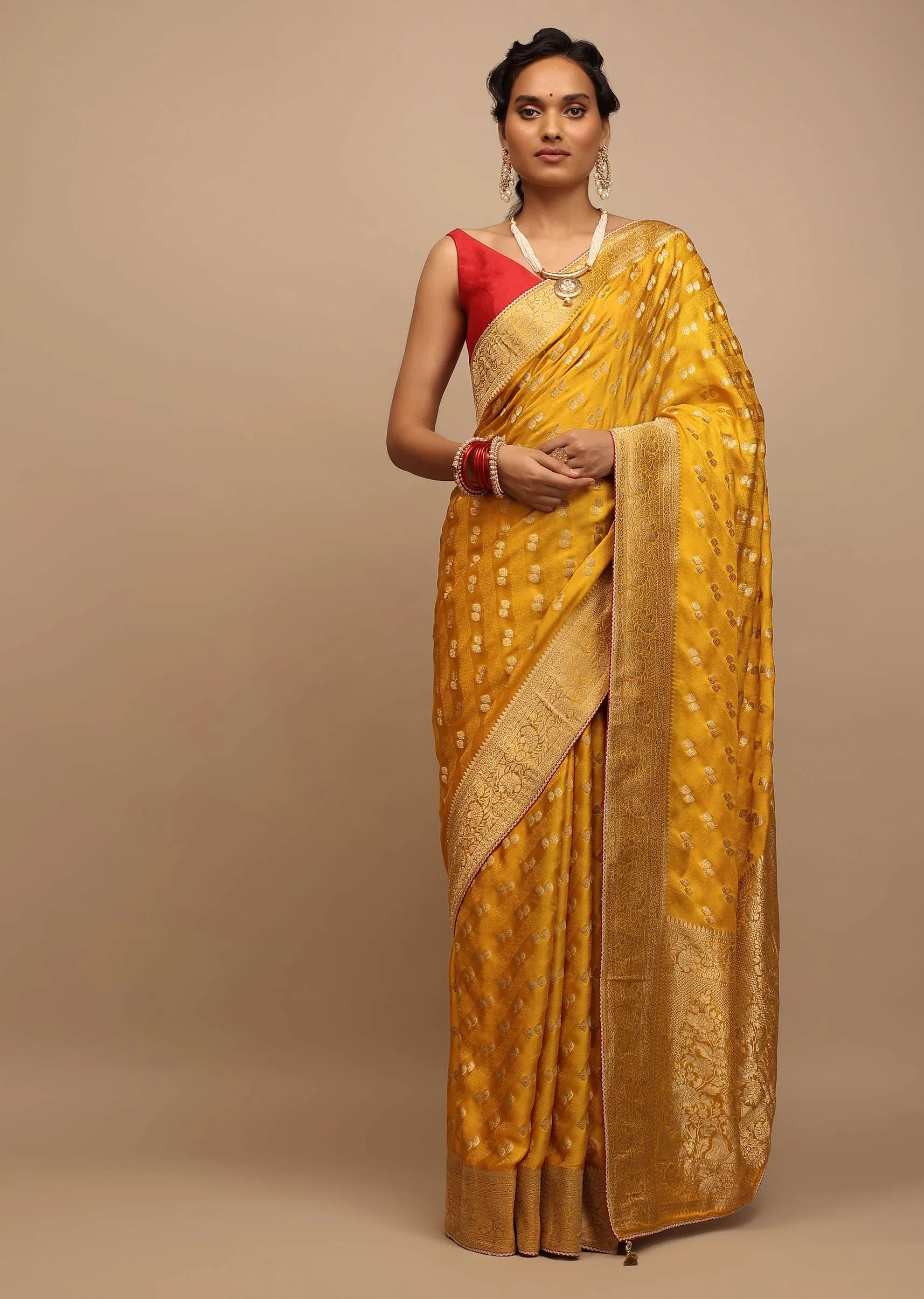 Amber Yellow Saree In Satin With Woven Golden Buttis And Floral Pallu Design