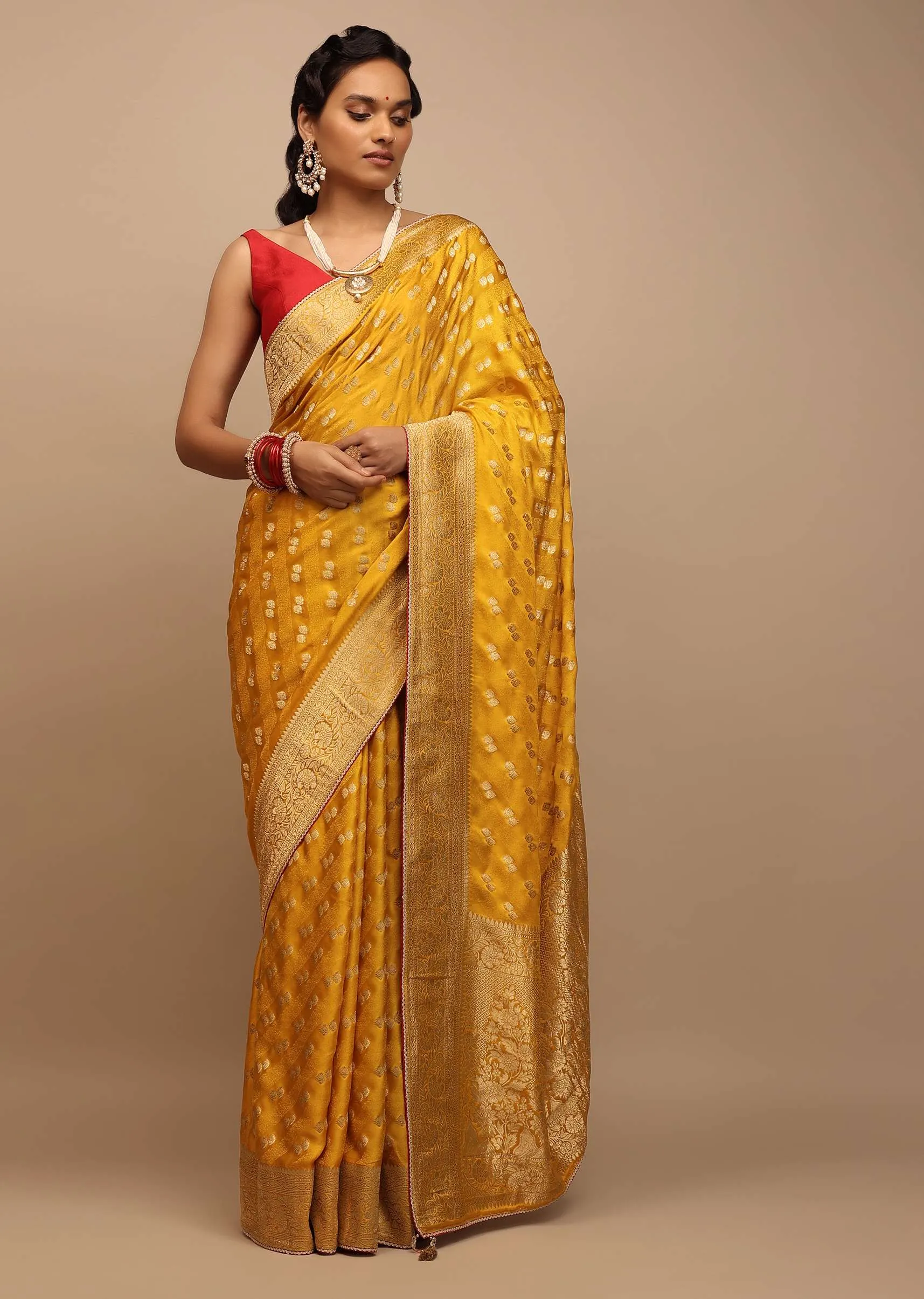 Amber Yellow Saree In Satin With Woven Golden Buttis And Floral Pallu Design
