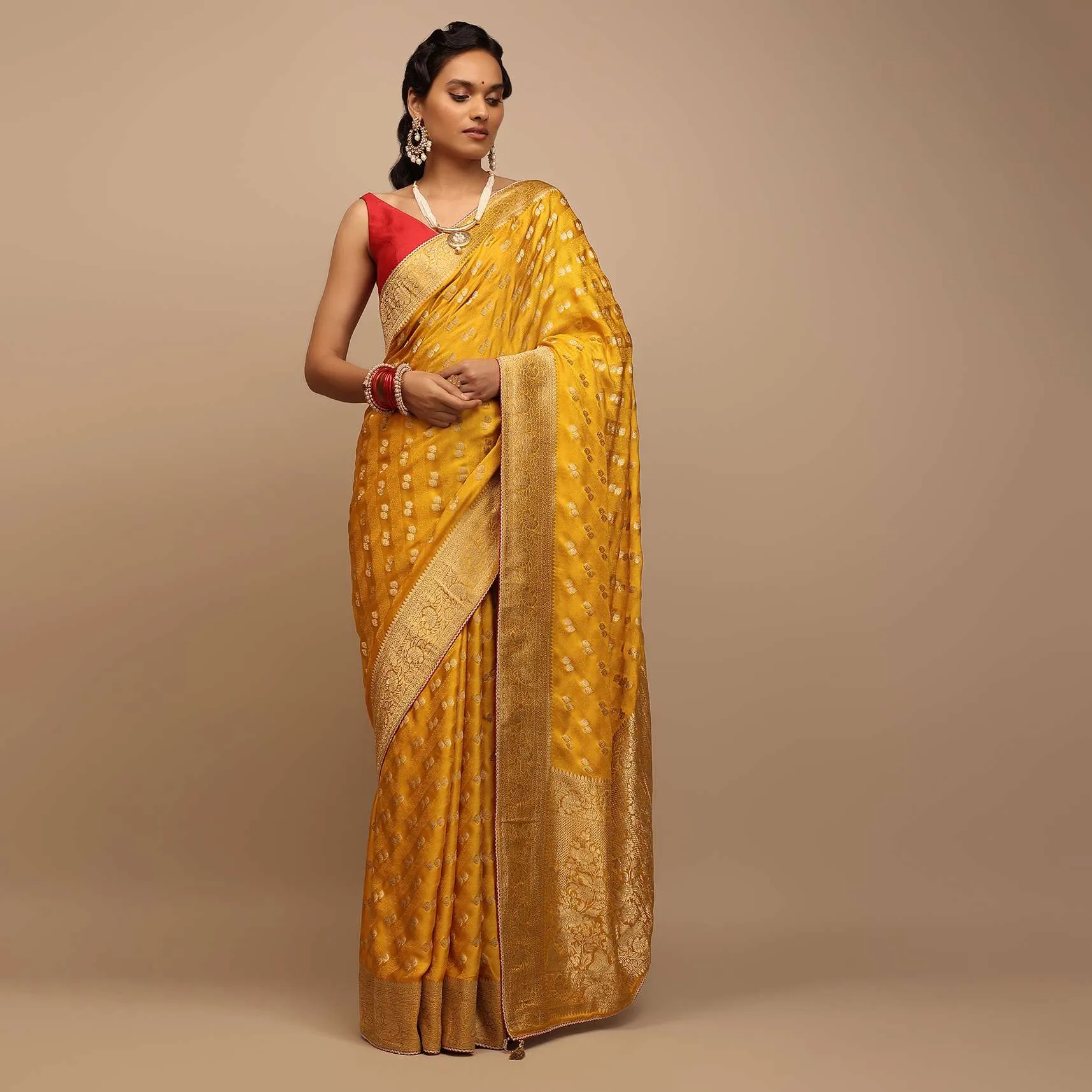 Amber Yellow Saree In Satin With Woven Golden Buttis And Floral Pallu Design
