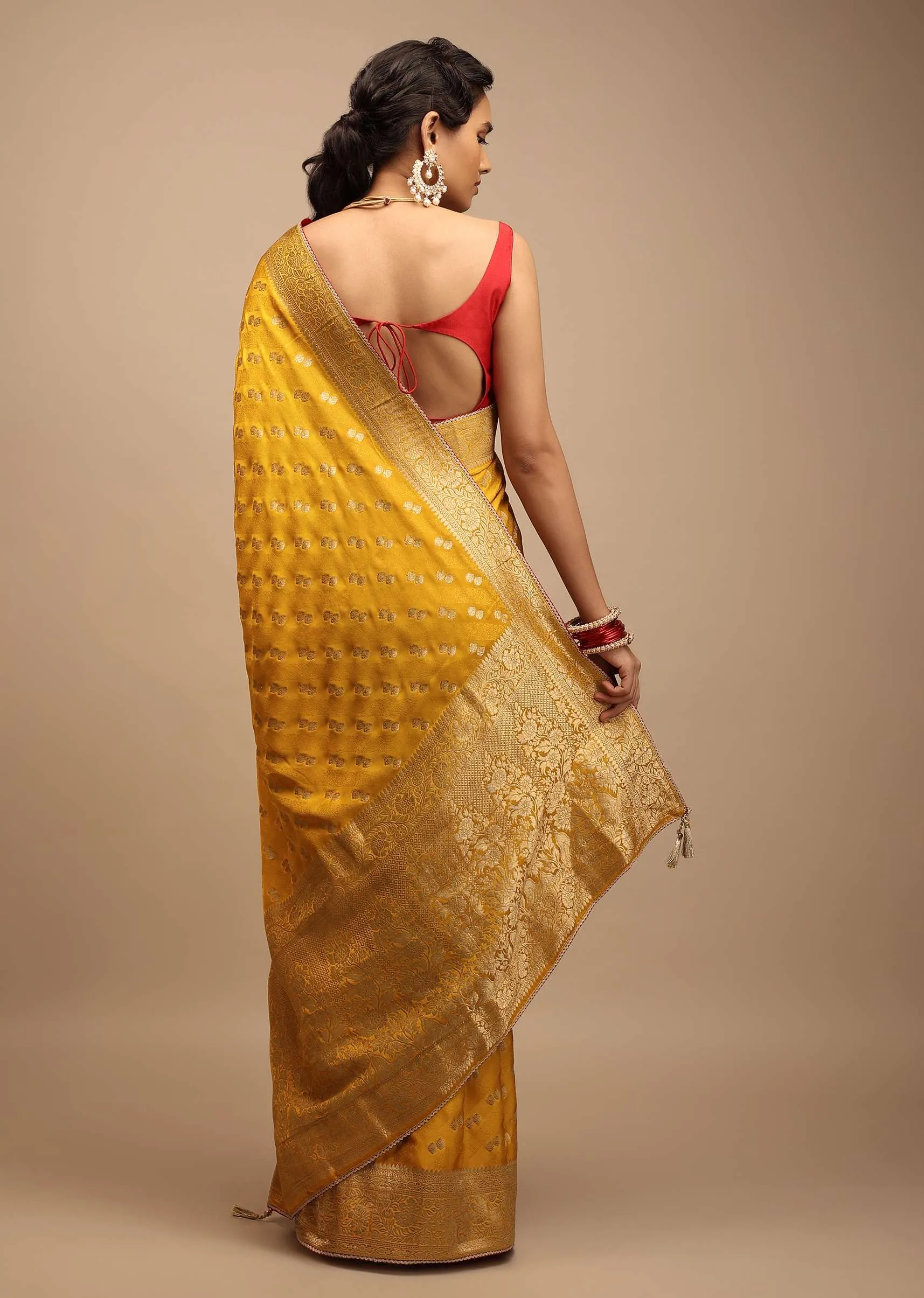 Amber Yellow Saree In Satin With Woven Golden Buttis And Floral Pallu Design