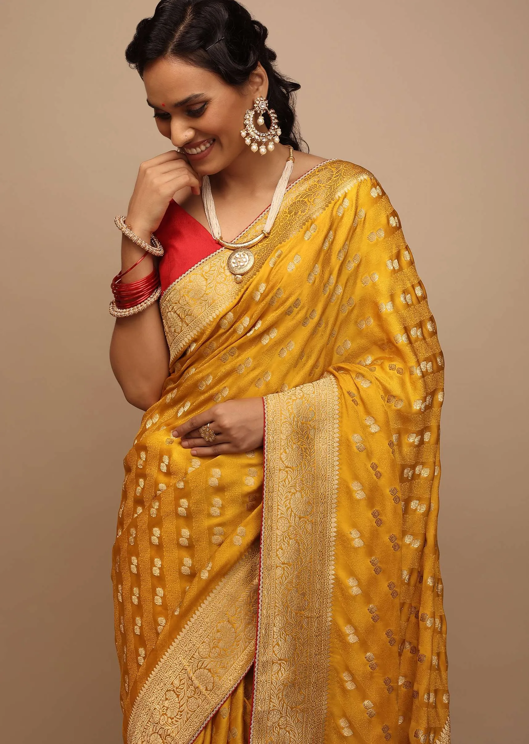 Amber Yellow Saree In Satin With Woven Golden Buttis And Floral Pallu Design