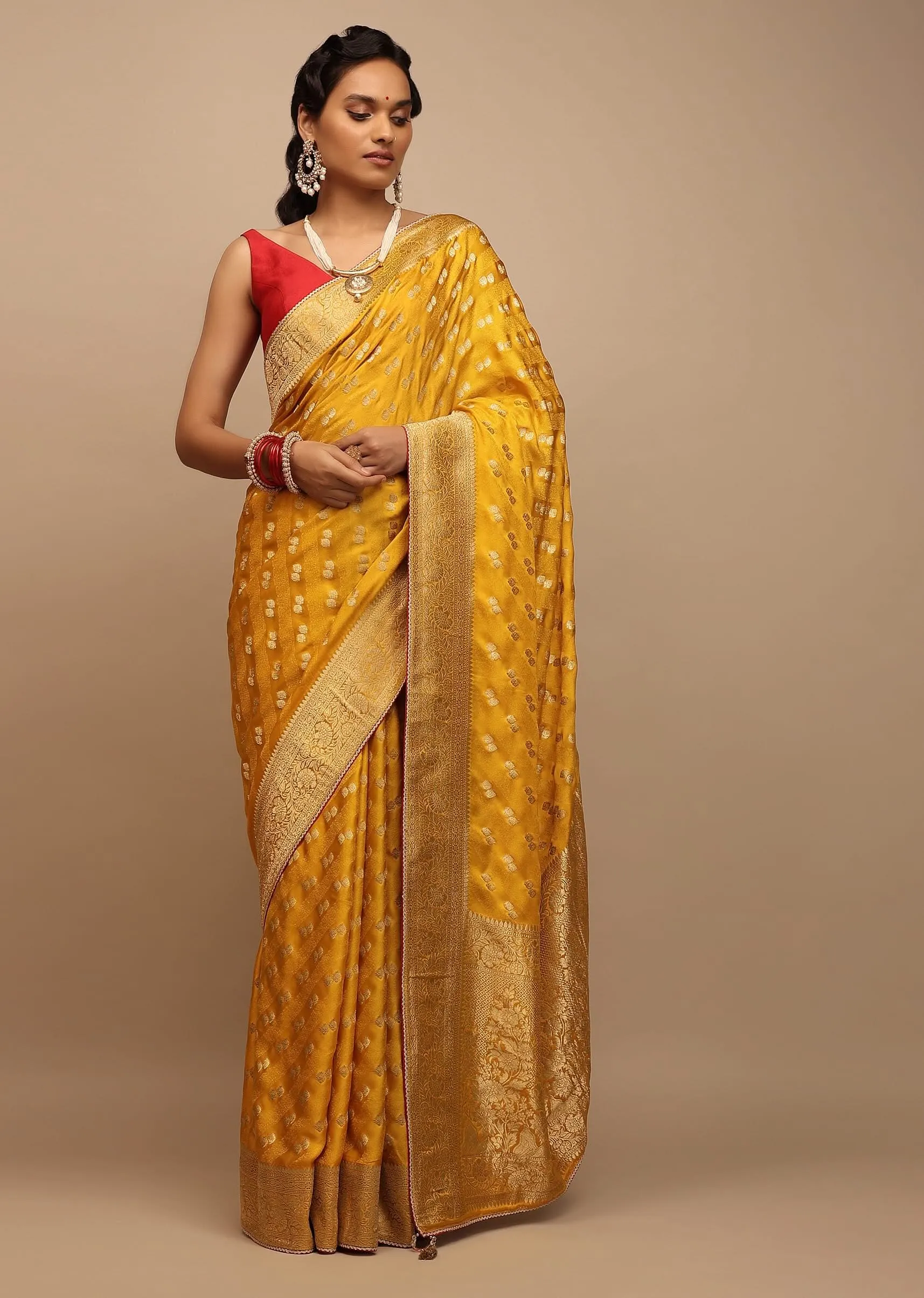 Amber Yellow Saree In Satin With Woven Golden Buttis And Floral Pallu Design